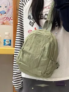 Casual nylon mini backpack for women, lightweight travel daypack and stylish sling chest bag.
