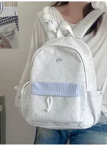 Zaino in tela stile coreano, borsa casual per studenti con ciondolo in peluche carino e pratico.