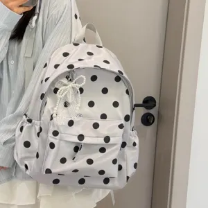 Korean style polka dot backpack with lace pearl bow, lightweight fashion school bag for girls.