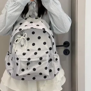 Korean style polka dot backpack detailed view featuring cute pearl lace bow pendant for daily use.