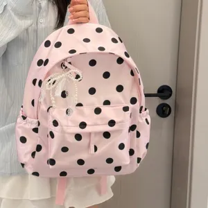 Cute Korean style pink polka dot backpack detail showcasing sweet design and pearl pendant.
