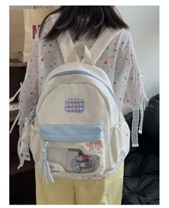 Joli sac à dos ita blanc avec fenêtre transparente, nœud papillon et grande capacité.