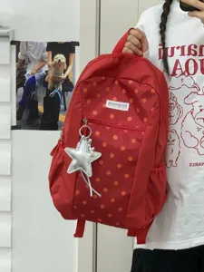 Mochila roja de lunares para la escuela y viajes con gran capacidad y colgante de estrella.