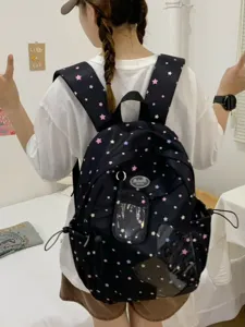Zaino nero in stile giapponese con stelle colorate, borsa casual per l'uso quotidiano.