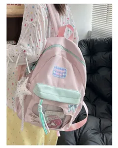 Joli sac à dos rose avec fenêtre transparente, grande capacité pour l'école et les fans.