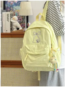 Zaino casual in tela gialla ricamato con cucciolo di fiocco carino stile coreano dettaglio