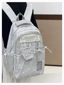 Korean style cute polka dot backpack for teens, lightweight school bag with star pendant and bear embroidery.