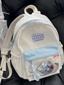 Joli sac à dos ita en toile grande capacité avec fenêtre transparente et nœud papillon.