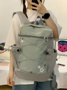 Korean style Y2K casual backpack with mesh side pockets, bungee cord, and daily commuting design.