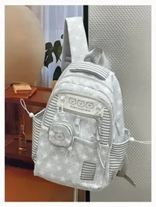 Korean style teenage girl school backpack with cute star print, spacious and lightweight.