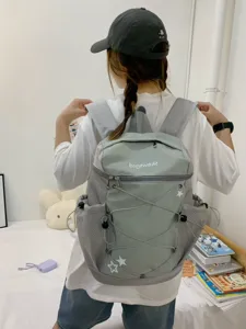 Korean style millennium casual backpack for women, light commuter school bag with mesh pockets.