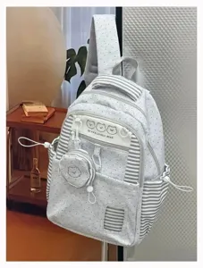Korean style cute polka dot school backpack with striped design, large capacity and lightweight.