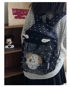 Black polka dot ita backpack with clear window and cute plush toy for daily school use.