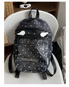Black polka dot ita backpack with clear window and cute wings, ideal for daily use.