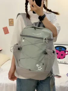 Korean style millennium original niche backpack, light green and grey casual commuter student bag.