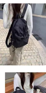 Korean style polka dot casual backpack for women and men, lightweight daily travel school bag.