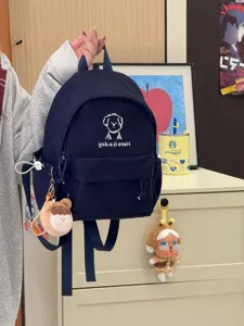 Cute cartoon dog canvas backpack, minimalist style casual school bag for teenage girls and students.