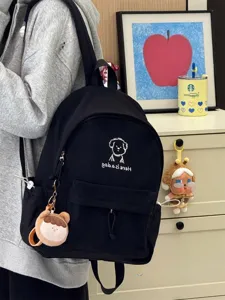 Korean style canvas backpack with cute puppy print, minimalist black school bag for students.