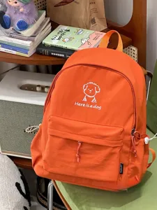 Korean ins style cute puppy backpack simple versatile orange canvas school bag for women