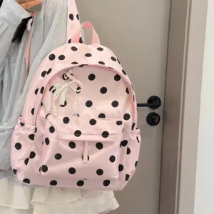Korean style pink polka dot backpack with cute pearl pendant, lightweight school bag for girls.