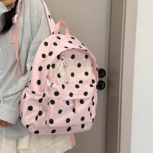 Cute pink black polka dot backpack detail, lightweight student school bag with cute pendant.