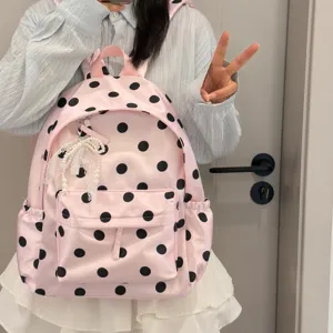 Korean style pink polka dot backpack with cute pearl pendant for school and casual use daily.