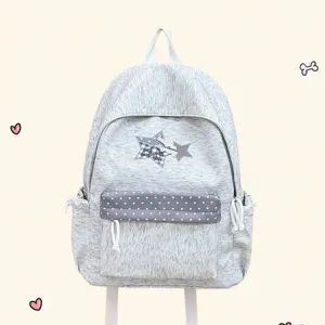 Vue détaillée du joli sac à dos gris avec motif d'étoiles et compartiments spacieux.