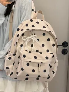 Korean style polka dot lightweight backpack for school girls, cute aesthetic casual daily book bag.