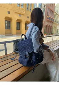 Detailed view of the Korean style star patterned canvas casual backpack with spacious capacity.