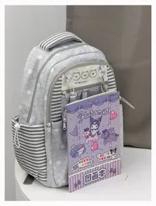 Detail view of grey polka dot school backpack, durable material, versatile daily use student bag
