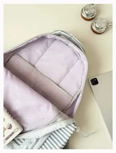 Detailed view of the Korean style school backpack interior with purple lining and compartments.