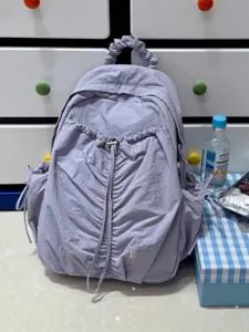 Detail view of the Korean style pleated backpack in lavender, lightweight and stylish.