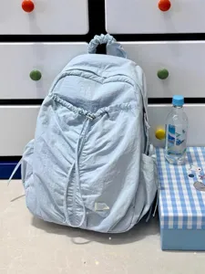 Light blue ruched backpack detail, cute casual student school bag with lightweight design.