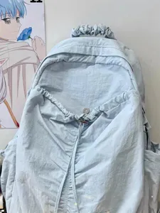 Light blue Korean style ruched backpack, lightweight travel school bag with drawstring detail.