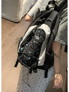 Outdoor casual backpack for men and women, large capacity travel school bookbag stylish.