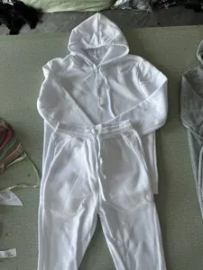 Men autumn solid white hoodie and sweatpants two piece casual sportswear set for daily wear.