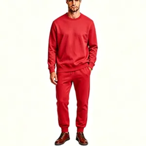 Red fleece tracksuit detail, soft warm fabric, solid crewneck sweatshirt, casual pants.