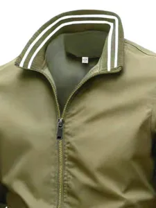 Close-up detail of men green stand collar jacket featuring white stripe collar and front zipper.