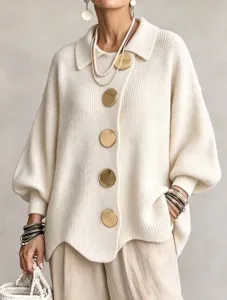 Chic oversized knit cardigan with large gold buttons and lapel collar for women.