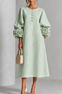Light green linen midi dress featuring 3D floral lantern sleeves and elegant French style.