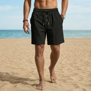 Vista detallada de pantalones cortos de playa casuales de lino para hombre en negro.
