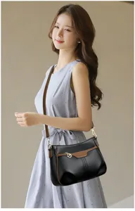 Zachte lederen dames schoudertas, stijlvolle casual crossbody tas met chic tweekleurig design.
