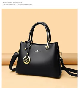 Lässige Damen Umhängetasche aus weichem Leder mit Metallanhänger, elegante Alltagstasche.