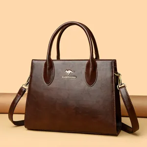 Bolso de hombro retro de cuero marrón para mujer, elegante bolso cruzado con herrajes metálicos.