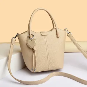 Vrouwen stijlvolle beige kunstlederen emmer handtas retro schouder crossbody tas