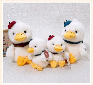 Cute plush duck toy with beret and scarf, soft healing doll gift for girls and kids ornament.