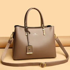 Braune Leder Damentasche groesse Kapazität elegante Handtasche mit goldener Hardware.