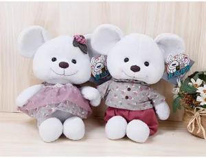 Detailed view of cute couple plush mouse toys wearing sweet outfits with soft fabric.
