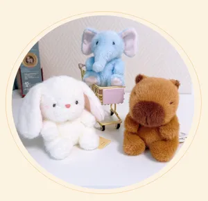 Cute plush toy set featuring white rabbit, blue elephant, and brown capybara doll details.