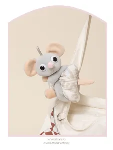 Cute grey plush mouse doll bag charm, quirky stuffed animal toy with leopard print dress.